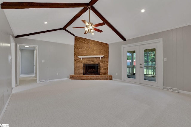 unfurnished living room with baseboards, light carpet, french doors, a ceiling fan, and vaulted ceiling with beams