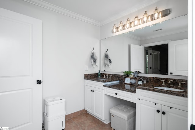 full bath featuring visible vents, crown molding, double vanity, and a sink