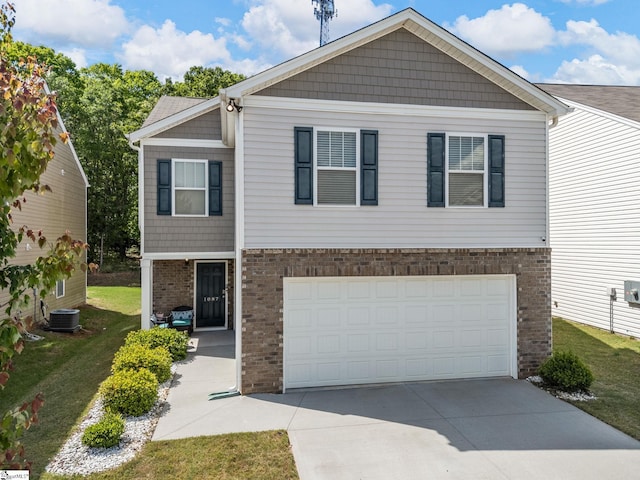 1087 Summerlin Trl, Duncan, SC 29334 - craftsman house with cooling unit, concrete driveway, an attached garage, brick siding, and a front lawn
