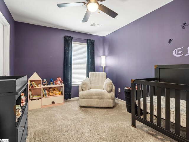 1087 Summerlin Trl, Duncan, SC 29334 - carpeted bedroom with visible vents, ceiling fan, a nursery area, and baseboards