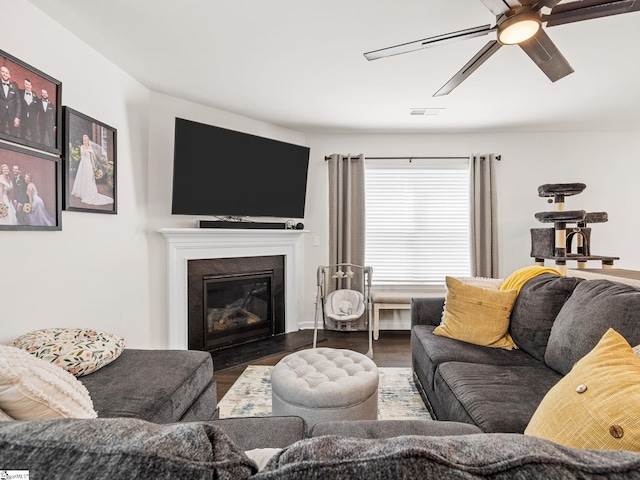 1087 Summerlin Trl, Duncan, SC 29334 - living room with a glass covered fireplace, wood finished floors, a ceiling fan, and visible vents
