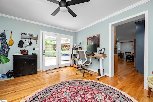 office with crown molding, a ceiling fan, wood finished floors, and baseboards