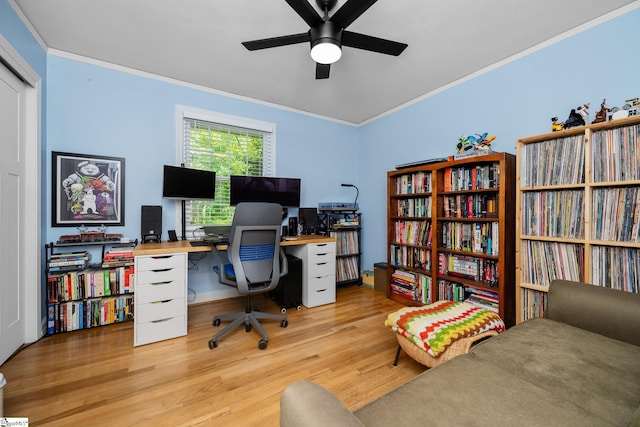 office space with crown molding, ceiling fan, and wood finished floors