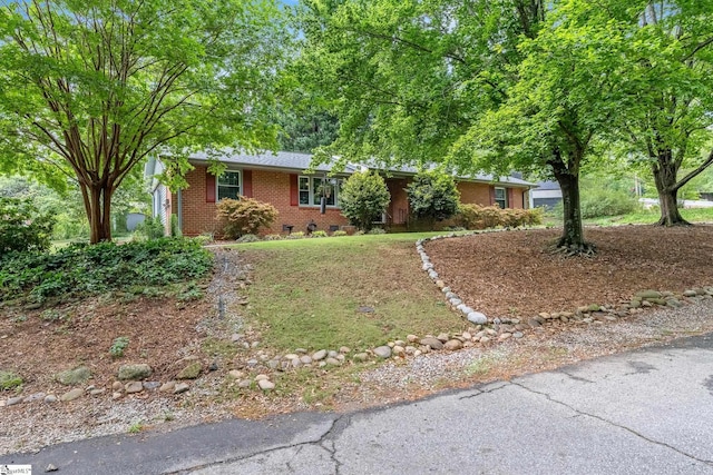 single story home featuring crawl space and brick siding