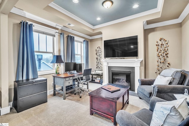 living area with recessed lighting, a glass covered fireplace, visible vents, baseboards, and ornamental molding