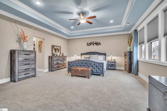 bedroom featuring recessed lighting, a raised ceiling, and carpet floors