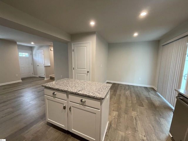 kitchen with recessed lighting, white cabinets, dark wood finished floors, and baseboards