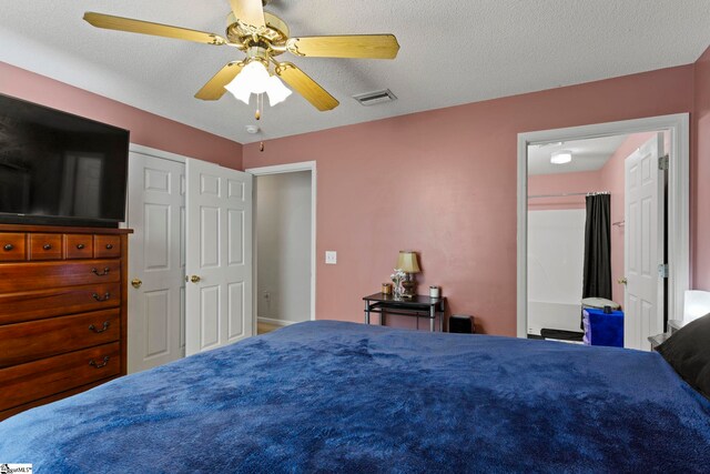 bedroom featuring a ceiling fan and visible vents