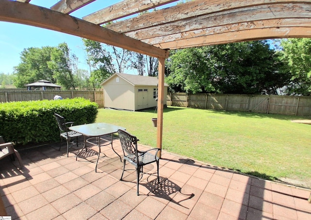 view of patio / terrace with a storage shed, a fenced backyard, an outbuilding, and a pergola