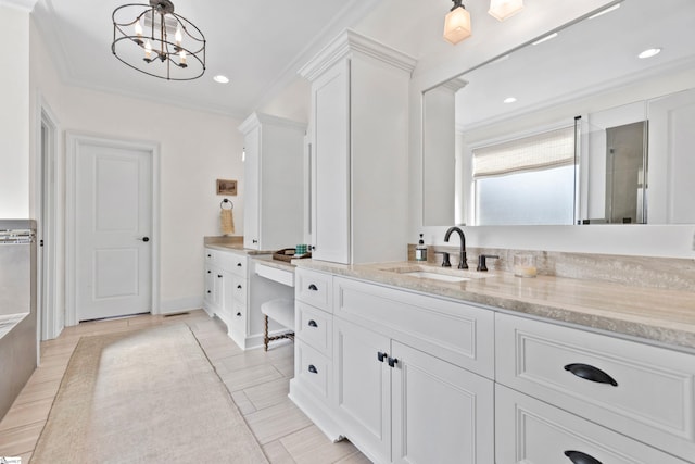 bathroom with a shower with door, an inviting chandelier, recessed lighting, vanity, and tile patterned flooring