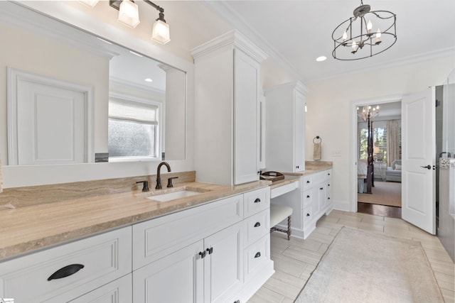 ensuite bathroom with a chandelier, recessed lighting, ensuite bath, and vanity