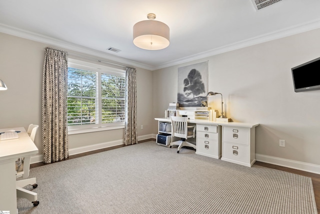 office space featuring visible vents, crown molding, and baseboards