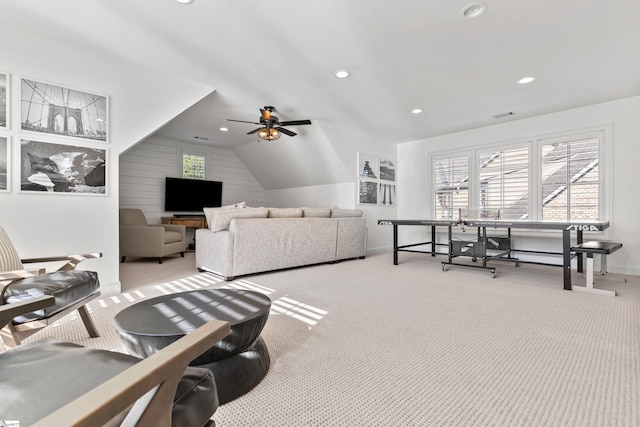 carpeted living area featuring baseboards, recessed lighting, a ceiling fan, and lofted ceiling