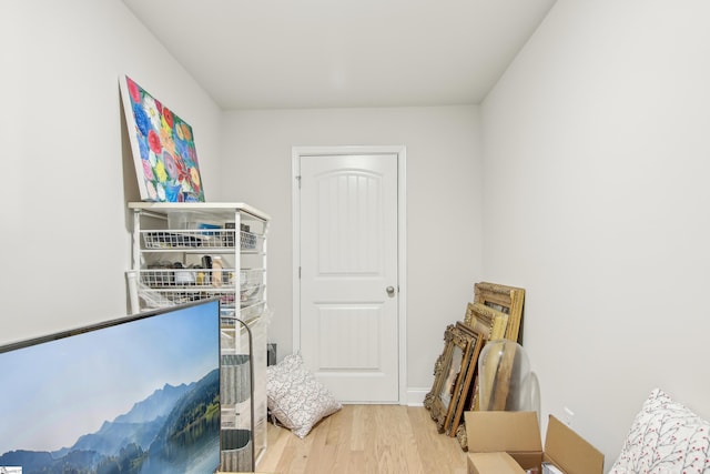 bedroom featuring wood finished floors