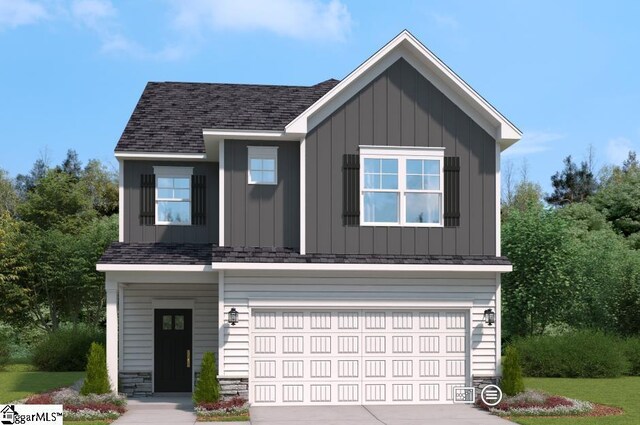 view of front of house with concrete driveway, an attached garage, and board and batten siding