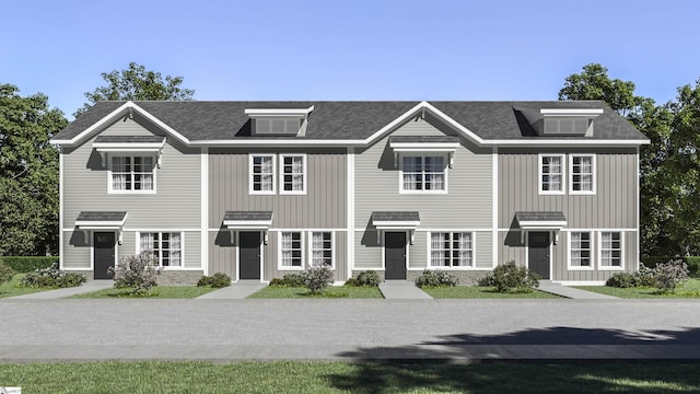 view of front of home with board and batten siding and stone siding