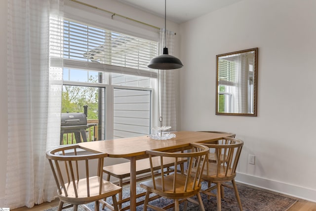 313 Glendon St, Greer, SC 29651 - dining area featuring baseboards and wood finished floors