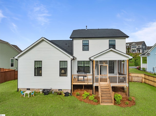 313 Glendon St, Greer, SC 29651 - back of property featuring a fenced backyard, a yard, and a sunroom
