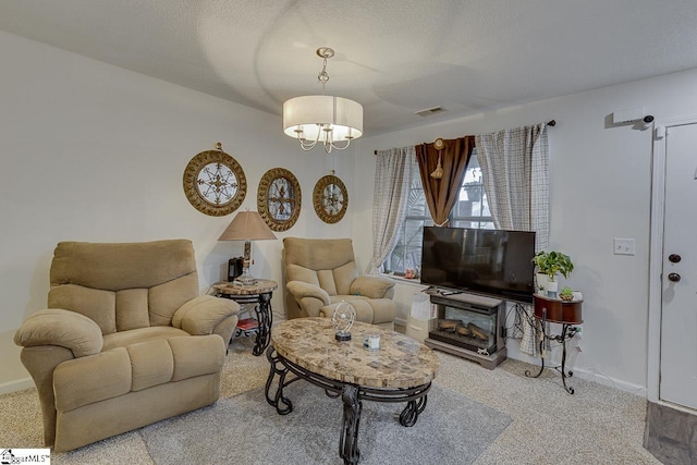 3 Heatherfield Dr, Simpsonville, SC 29680 - carpeted living room featuring baseboards, visible vents, and a notable chandelier