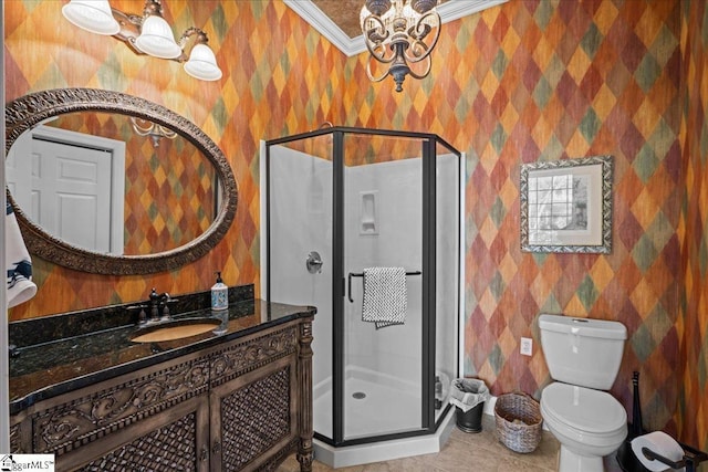 bathroom with tile patterned floors, wallpapered walls, a shower stall, ornamental molding, and vanity