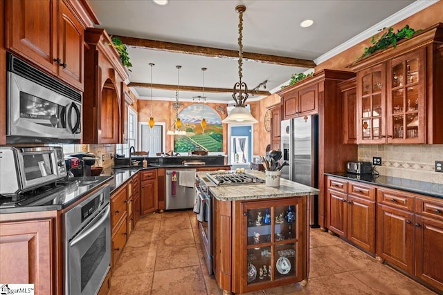 kitchen with stainless steel appliances, ornamental molding, and backsplash