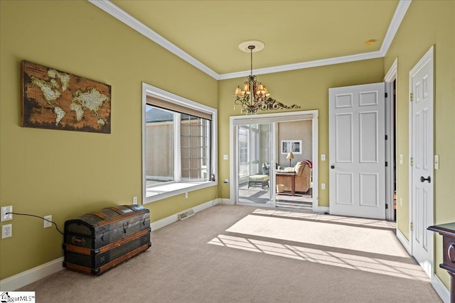 dining room featuring ornamental molding, a notable chandelier, visible vents, and carpet flooring