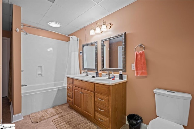 full bath featuring double vanity, shower / tub combo, toilet, and a sink