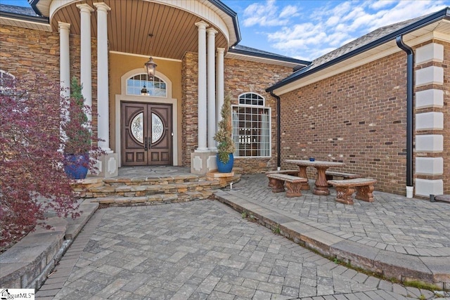 entrance to property with covered porch
