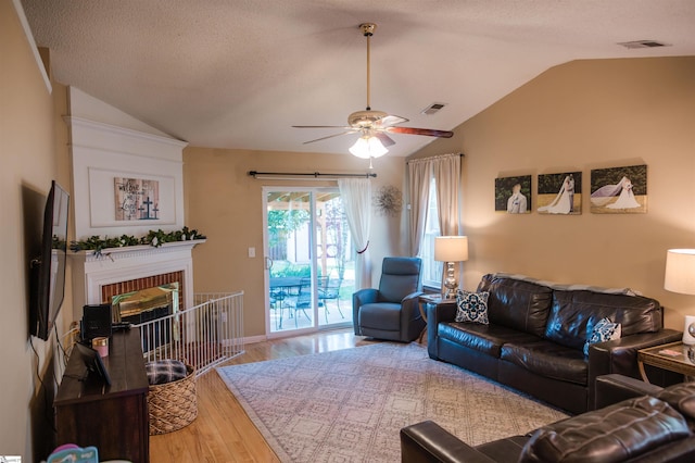 104 Fairview Lake Way, Simpsonville, SC 29680 - living area with wood finished floors, visible vents, ceiling fan, and vaulted ceiling