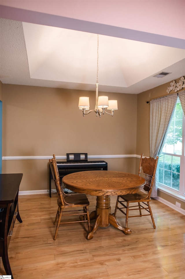 104 Fairview Lake Way, Simpsonville, SC 29680 - dining area featuring light wood-style flooring, a notable chandelier, and baseboards