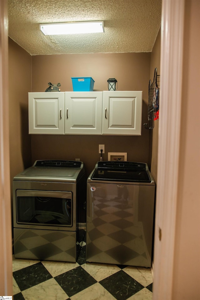 104 Fairview Lake Way, Simpsonville, SC 29680 - clothes washing area with a textured ceiling, cabinet space, and independent washer and dryer