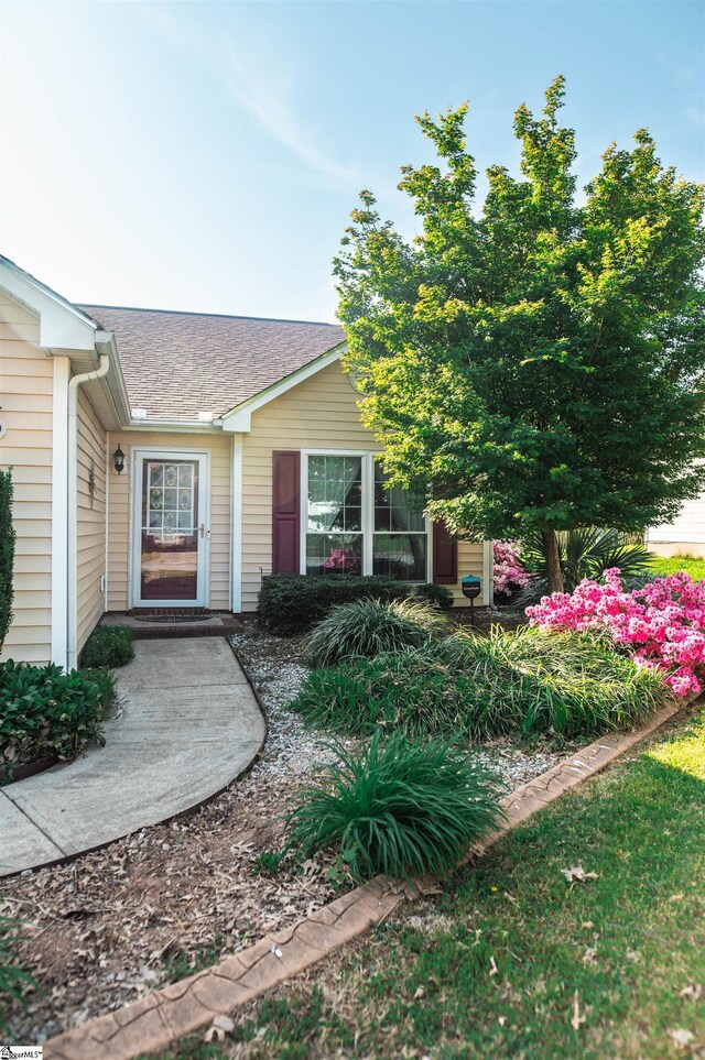 104 Fairview Lake Way, Simpsonville, SC 29680 - view of exterior entry featuring a shingled roof