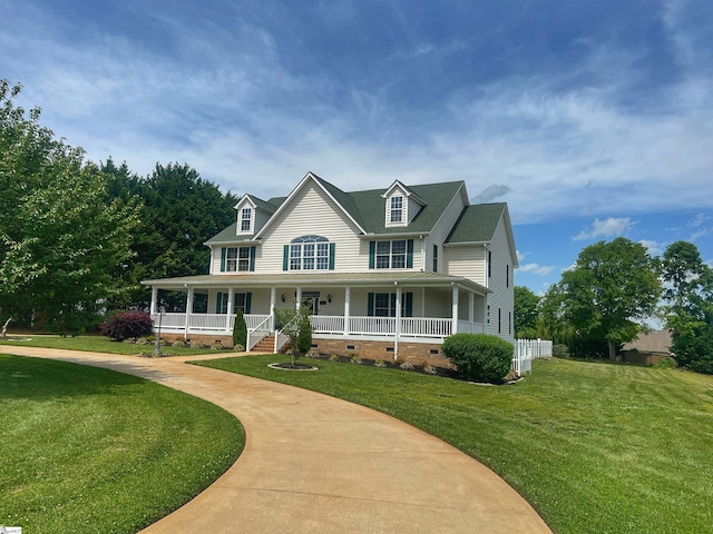 country-style home with a front lawn, crawl space, and covered porch