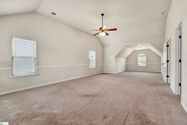 bonus room featuring carpet, a ceiling fan, vaulted ceiling, and baseboards