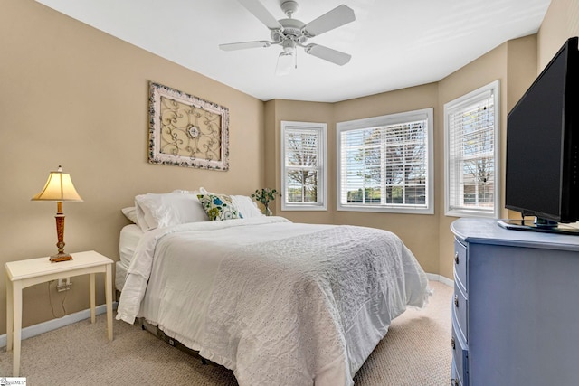 1230 Melton Rd Unit 104, West Union, SC 29696 - bedroom featuring a ceiling fan, multiple windows, light colored carpet, and baseboards