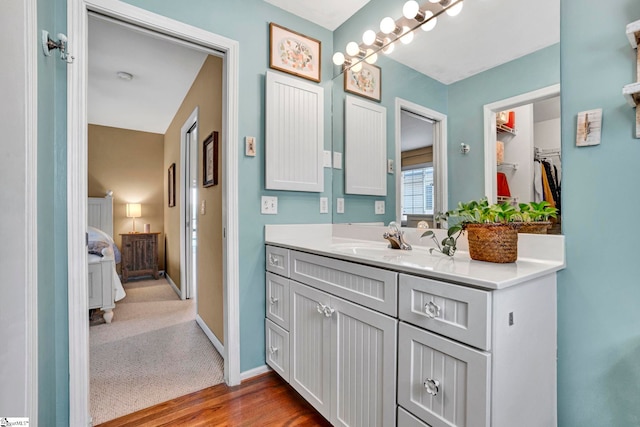 1230 Melton Rd Unit 104, West Union, SC 29696 - bathroom featuring connected bathroom, vanity, wood finished floors, and baseboards