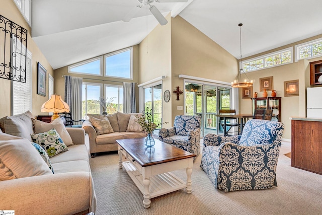 1230 Melton Rd Unit 104, West Union, SC 29696 - living area with ceiling fan with notable chandelier, high vaulted ceiling, carpet floors, and plenty of natural light