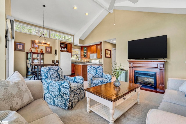 1230 Melton Rd Unit 104, West Union, SC 29696 - living area with recessed lighting, beam ceiling, high vaulted ceiling, a glass covered fireplace, and ceiling fan with notable chandelier