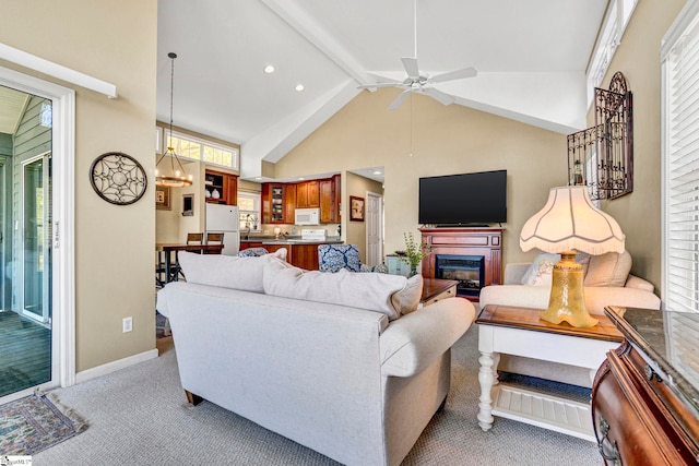1230 Melton Rd Unit 104, West Union, SC 29696 - carpeted living room with a glass covered fireplace, ceiling fan, plenty of natural light, and beamed ceiling