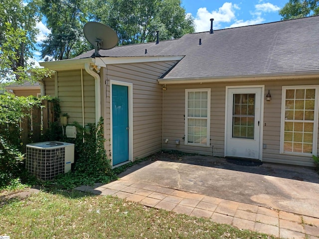 315 Farnsworth Rd, Spartanburg, SC 29301 - back of property featuring central AC, a patio, roof with shingles, and fence