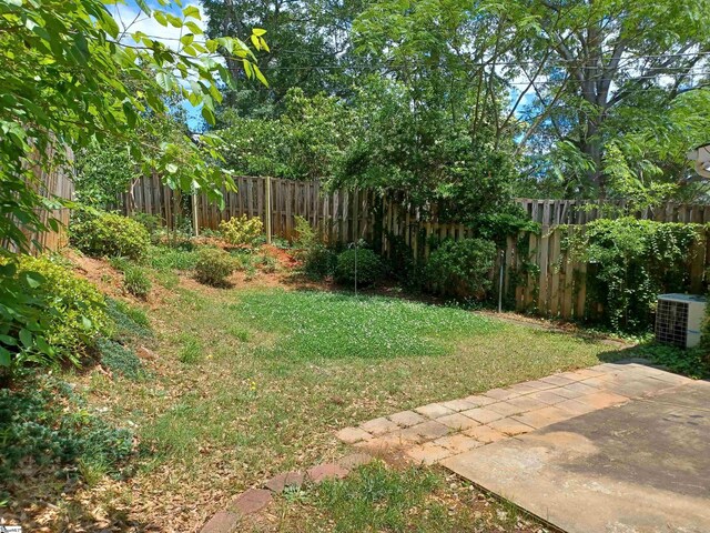 315 Farnsworth Rd, Spartanburg, SC 29301 - view of yard featuring central AC and a patio