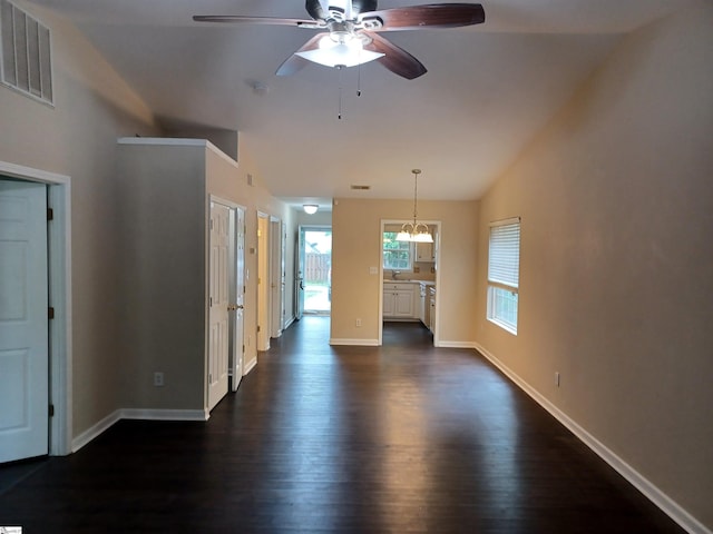 315 Farnsworth Rd, Spartanburg, SC 29301 - unfurnished room with ceiling fan, dark wood-style flooring, a chandelier, baseboards, and lofted ceiling