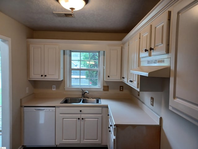 315 Farnsworth Rd, Spartanburg, SC 29301 - kitchen featuring white dishwasher, a sink, under cabinet range hood, light countertops, and white cabinets