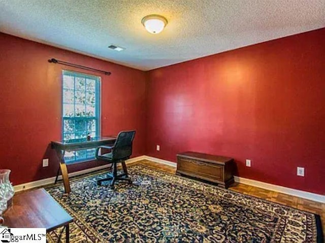 317 Farnsworth Rd, Spartanburg, SC 29301 - office featuring a textured ceiling, baseboards, and wood finished floors