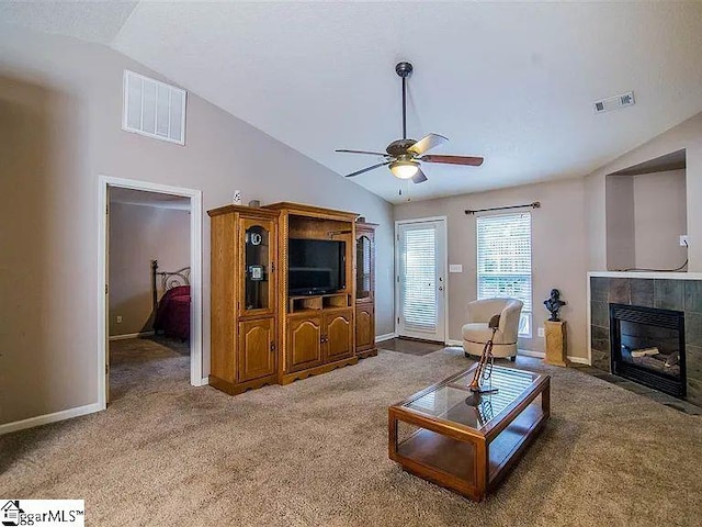 317 Farnsworth Rd, Spartanburg, SC 29301 - carpeted living area with lofted ceiling, a ceiling fan, baseboards, and a tiled fireplace