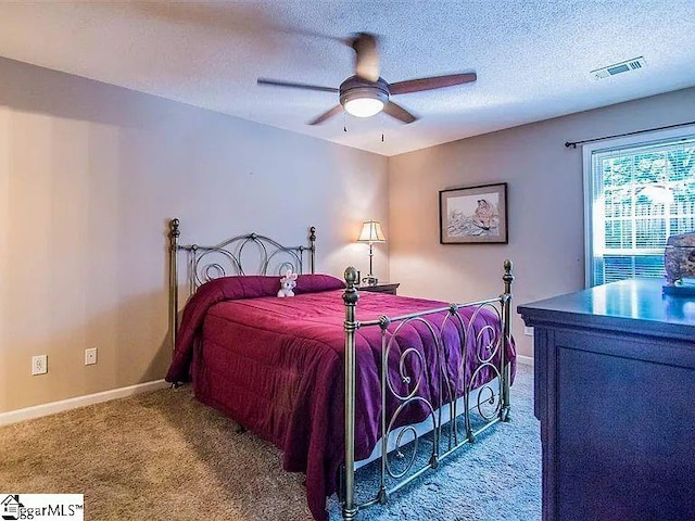 317 Farnsworth Rd, Spartanburg, SC 29301 - bedroom with carpet, a textured ceiling, baseboards, and ceiling fan