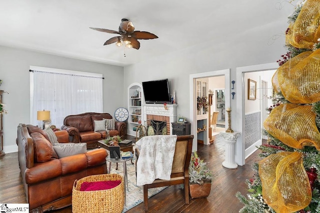 15 S Greenwood Ave, Ware Shoals, SC 29629 - living area with ceiling fan, baseboards, dark wood finished floors, and a brick fireplace
