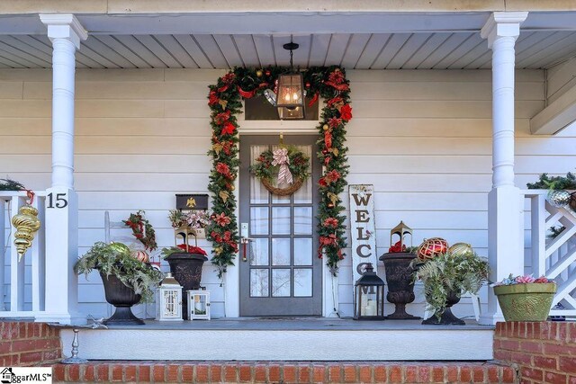 15 S Greenwood Ave, Ware Shoals, SC 29629 - view of exterior entry with covered porch
