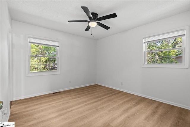 118 Rodney St, Moore, SC 29369 - empty room with baseboards, visible vents, ceiling fan, and light wood-style flooring