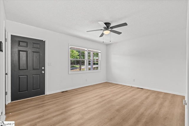 118 Rodney St, Moore, SC 29369 - interior space with visible vents, a ceiling fan, a textured ceiling, and light wood-style flooring